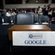 FILE- In this Sept. 5, 2018, file photo an empty chair reserved for Google's parent Alphabet, which refused to send its top executive, is seen before the Senate Intelligence Committee hearing on Capitol Hill in Washington. Momentum is gaining in Washington for a privacy law that would sharply reduce the ability of the largest technology companies to collect and distribute people’s personal data. Behind the drive for a law is rising concern over private data being compromised or distributed by Facebook, Google and other tech giants that have earned riches from marketing consumer information. (AP Photo/Jose Luis Magana, File)